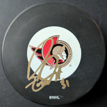 Load image into Gallery viewer, Ron Tugnutt Signed Autographed Ottawa Senators Official NHL Hockey Puck