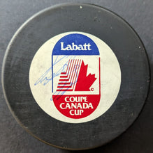 Load image into Gallery viewer, Eric Lindros Autographed Canada Cup Promotional Hockey Puck Signed NHL HOF JSA