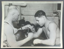 Load image into Gallery viewer, 1934 Type 1 Associated Press Photo 20 Year Old Joe Louis Puts On Boxing Gloves