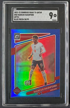 Load image into Gallery viewer, 2021-22 Donruss Road to Qatar #55 Marcus Rashford Optic Blue Prizm 50/99 SGC 9