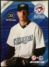 Load image into Gallery viewer, 2018 Toronto Blue Jays Season Opening Game Program Roy Halladay #32 Retired