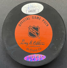 Load image into Gallery viewer, Gordie Howe Autographed Signed Detroit Red Wings Puck NHL Hockey JSA In Glas Co