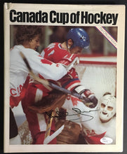 Load image into Gallery viewer, Bobby Orr Autographed 1976 Canada Cup Of Hockey Book Cover Photo JSA Authentic