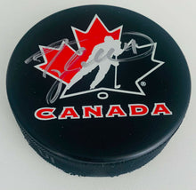 Load image into Gallery viewer, Taylor Hall Signed Team Canada Hockey Puck Autographed Trench MFG COA