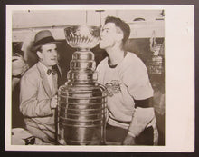 Load image into Gallery viewer, 1954 Amazing NHL Hockey Press Photo Detroit Red Wings Tony Leswick Kissing Cup