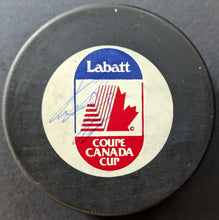 Load image into Gallery viewer, Eric Lindros Autographed Canada Cup Promotional Hockey Puck Signed NHL HOF JSA
