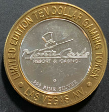 Load image into Gallery viewer, Monte Carlo $10 Gaming Token .999 Silver 2000 Lance Burton Holding Cards
