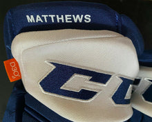 Load image into Gallery viewer, Auston Matthews Game Used Worn Hockey Gloves CCM 2019 NHL + MLSE LOA
