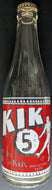 12oz Kik Cola Soda Glass Bottle With Football Player Graphic and Cap Vintage