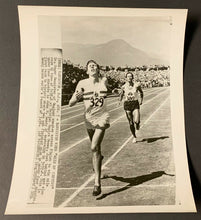 Load image into Gallery viewer, 1954 Roger Bannister Wire Photo Four Minute Mile Breaker Crosses Finish Line
