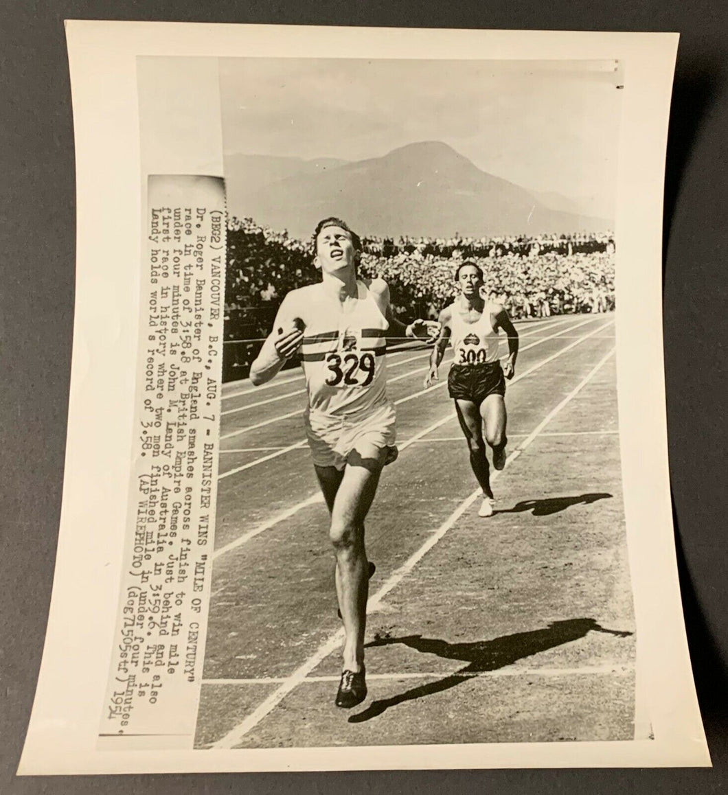 1954 Roger Bannister Wire Photo Four Minute Mile Breaker Crosses Finish Line