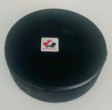 Load image into Gallery viewer, Taylor Hall Signed Team Canada Hockey Puck Autographed Trench MFG COA
