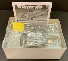Load image into Gallery viewer, 2006 AMT ERTL 1957 Chrysler 300C Street Custom 1:25 Scale Model Kit Open Box

