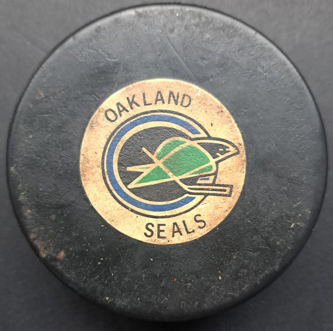 Late 60s Oakland Seals Vintage Converse NHL Game Used Hockey Puck California
