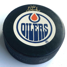 Load image into Gallery viewer, Grant Fuhr Signed Edmonton Oilers NHL Hockey Puck Autographed In Glas Co
