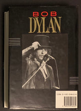 Load image into Gallery viewer, Bob Dylan Autobiography Hard Cover Book Review Cop Stamped Inside Issued To Canadian Recording Industry Executive Stan Klees, In Excellent Condition
