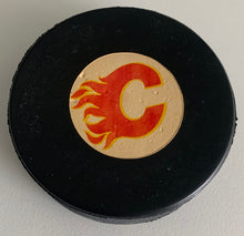 Load image into Gallery viewer, Calgary Flames NHL Game Puck Used 1980-1983 Viceroy Rubber Crested + Plastic Version
